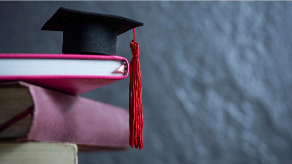 Easiest Online Associate Programs - featured image of graduation cap and college supplies