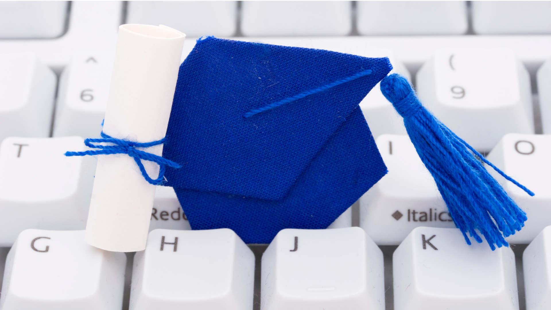 Easiest Online Certificate Programs - featured image of graduation cap and keyboard